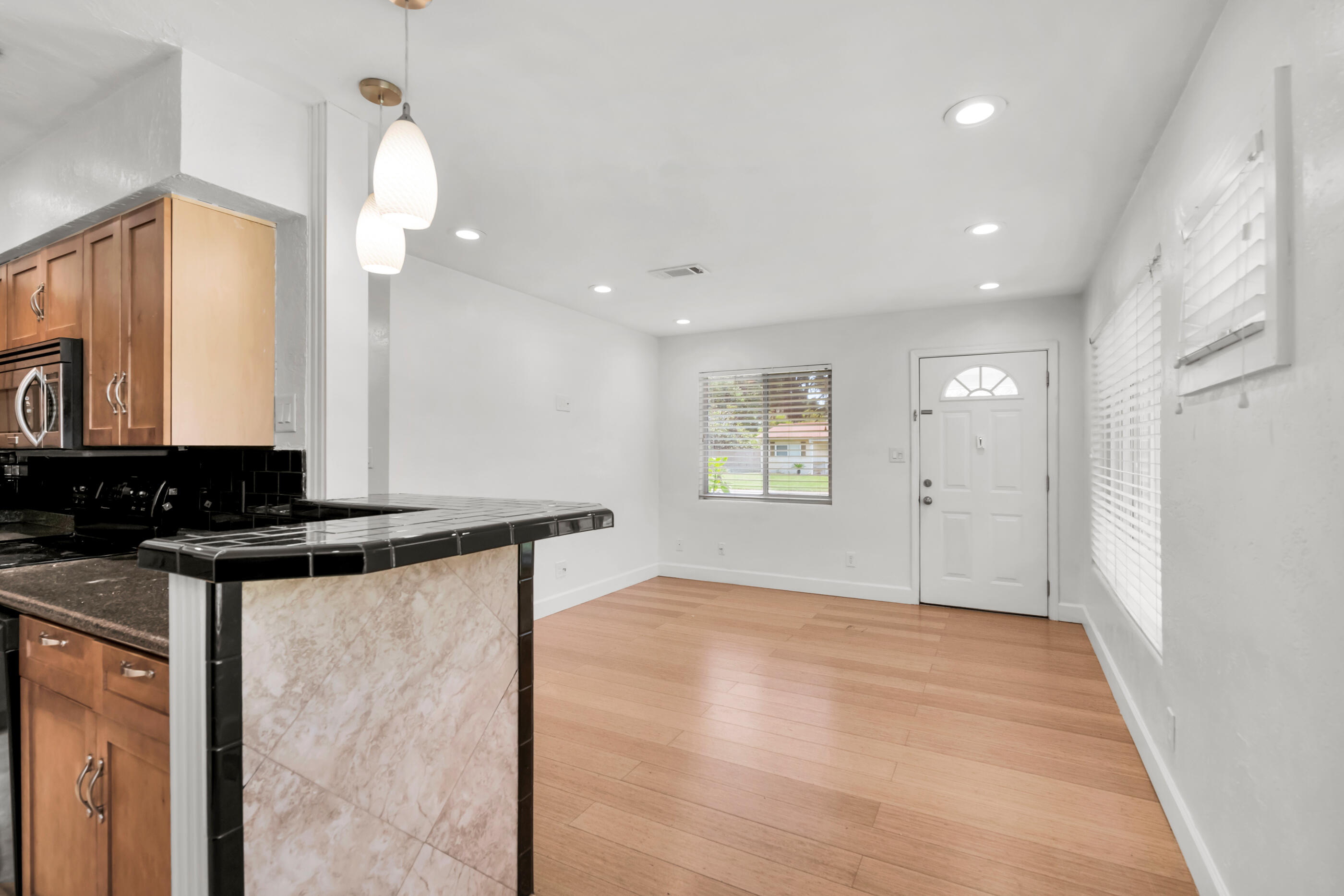600 Shrewsbury Road Mary Esther, FL 32569 - Photo 9 of 25 a view of a kitchen with a sink and a stove