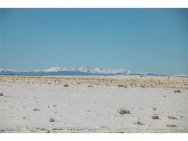 a view of wooden floor in a empty room