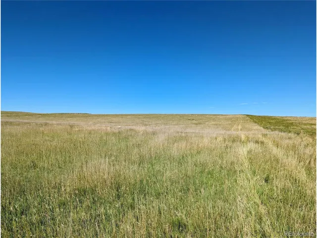 a view of beach and an ocean