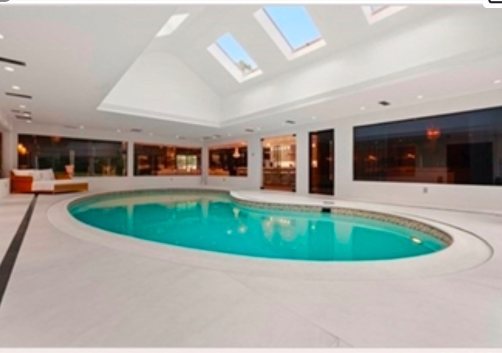 15 Scotch Dam Road Easton, MA 02375 - Photo 17 of 29 a swimming pool with outdoor seating