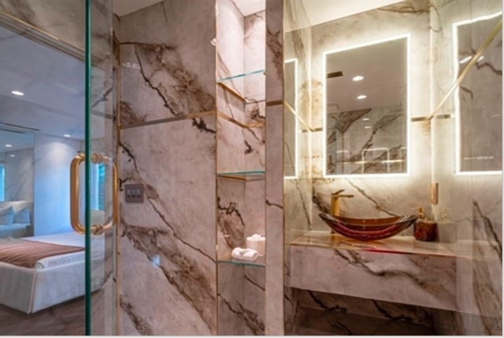 15 Scotch Dam Road Easton, MA 02375 - Photo 19 of 29 a living room with furniture and a potted plant