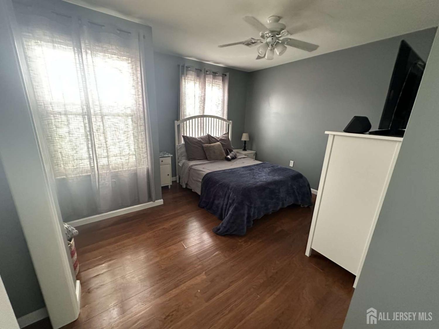 207 Remsen Avenue Avenel, NJ 07001 - Photo 16 of 24 a bedroom with a bed and a window