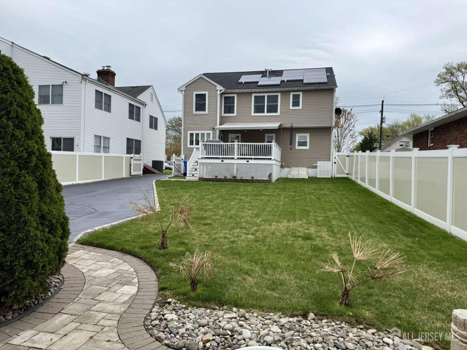 207 Remsen Avenue Avenel, NJ 07001 - Photo 20 of 24 a house view with a garden space