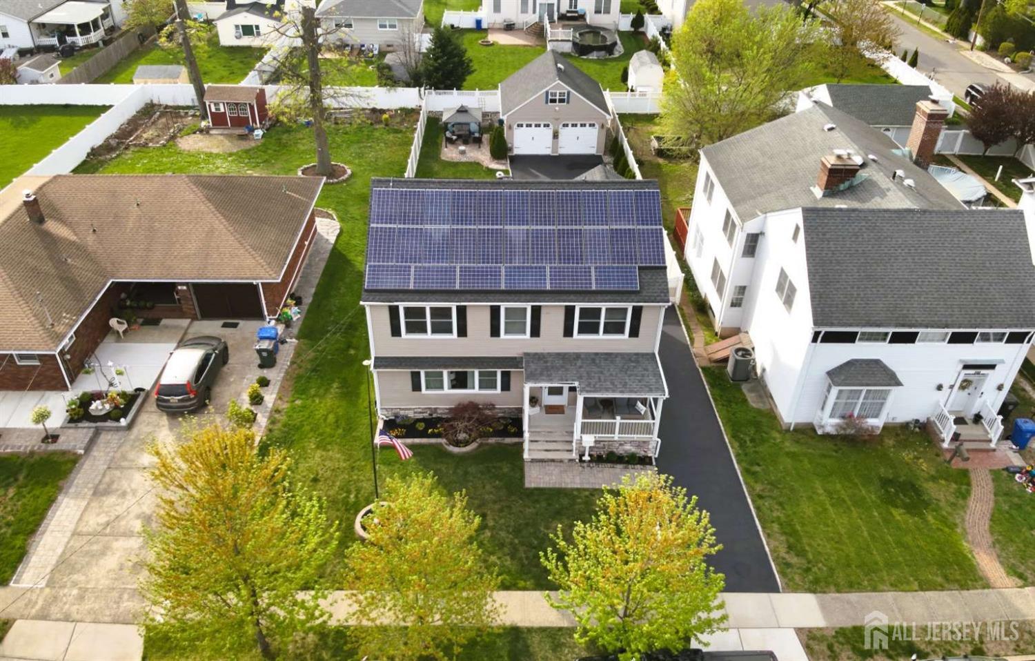 207 Remsen Avenue Avenel, NJ 07001 - Photo 23 of 24 an aerial view of residential houses with yard