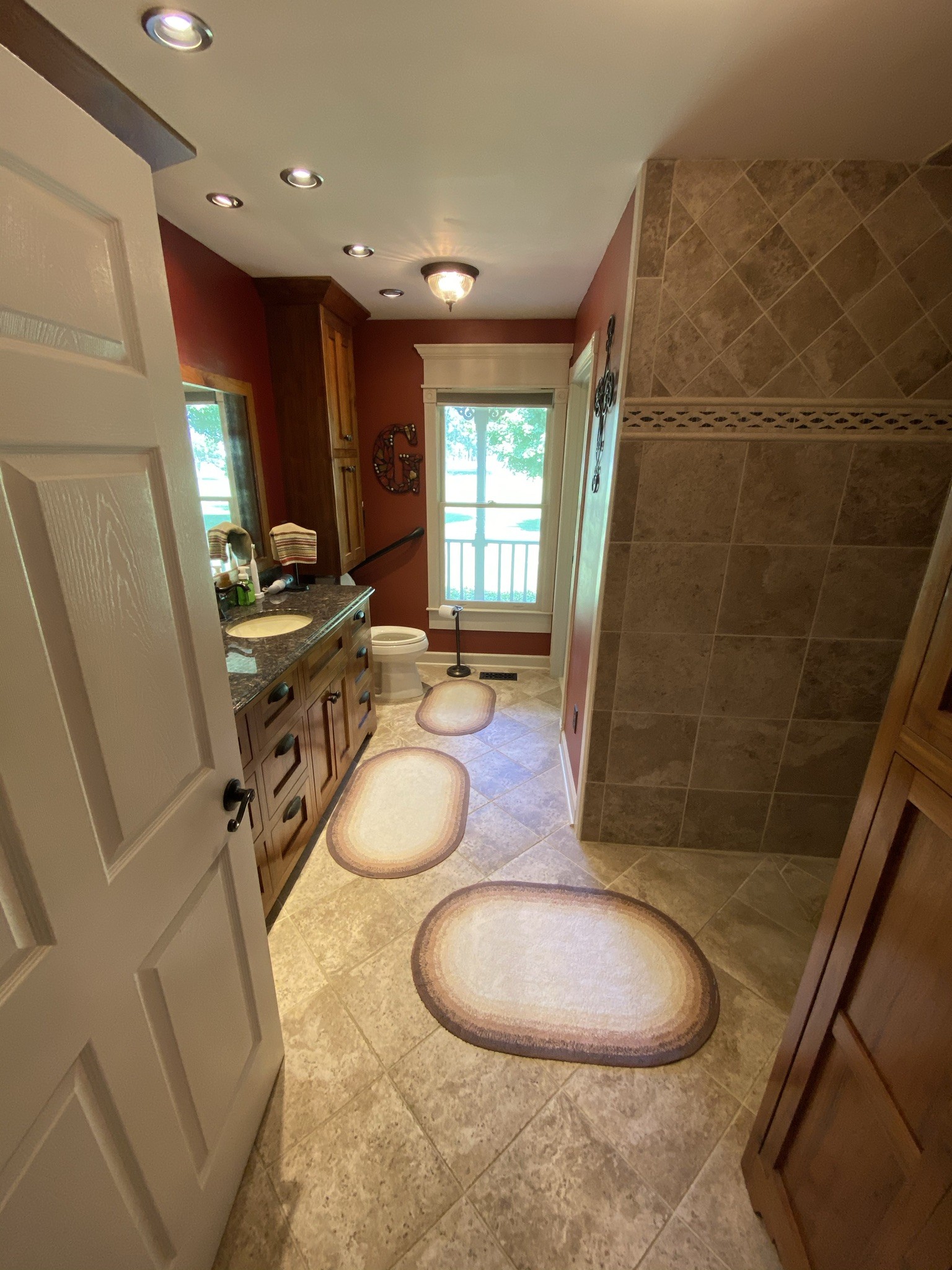 2743 Thompson Road Murfreesboro, TN 37128 - Photo 14 of 43 a bathroom with a sink a toilet and shower