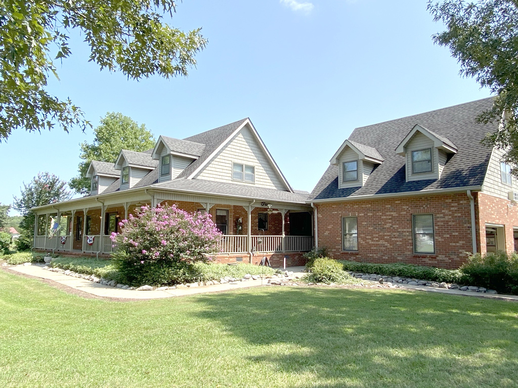 2743 Thompson Road Murfreesboro, TN 37128 - Photo 3 of 43 a front view of a house with garden