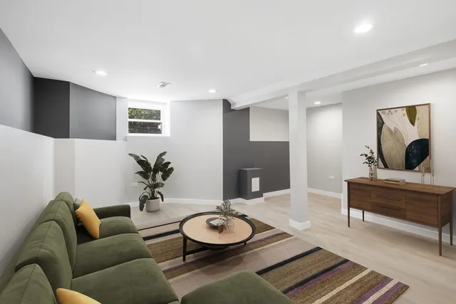 a living room with furniture and a rug
