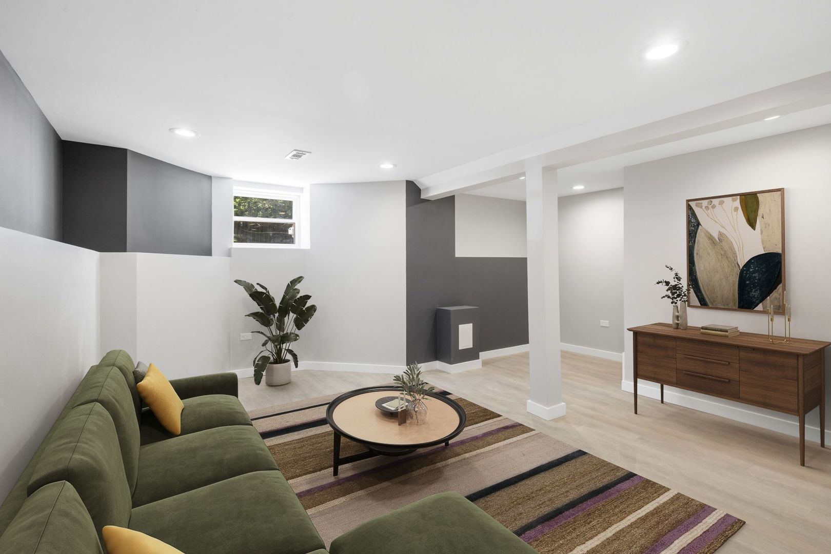 6129 North Ravenswood Avenue, Unit 1 Chicago, IL 60660 - Photo 18 of 33 a living room with furniture and a rug