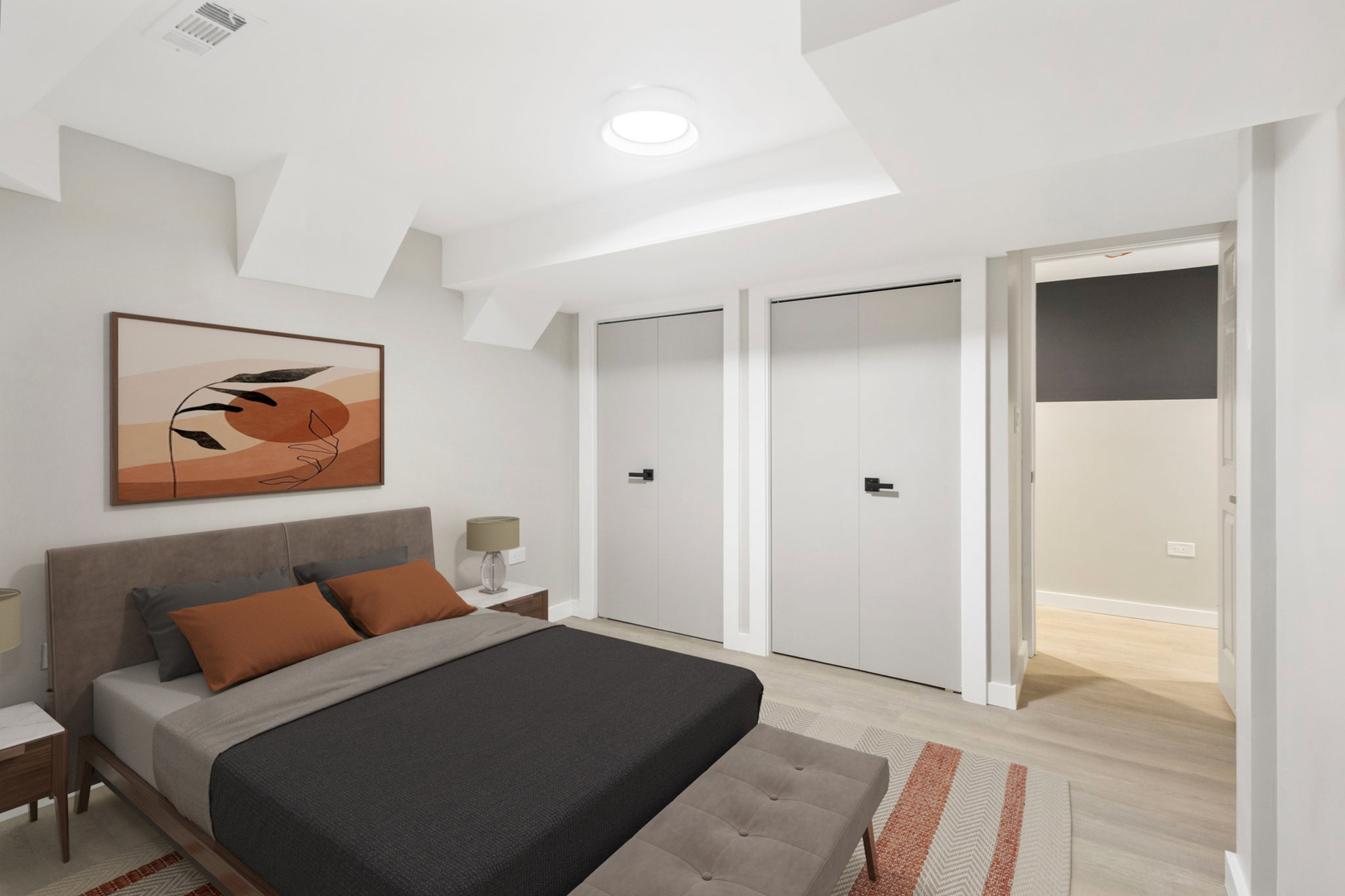 6129 North Ravenswood Avenue, Unit 1 Chicago, IL 60660 - Photo 21 of 33 a bedroom with a bed and painting on the wall