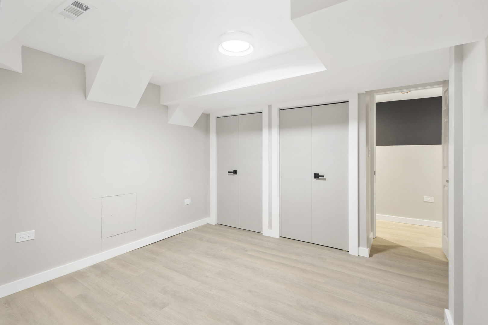 6129 North Ravenswood Avenue, Unit 1 Chicago, IL 60660 - Photo 22 of 33 a view of an empty room