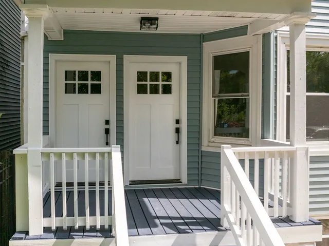 front view of a house with wooden floor