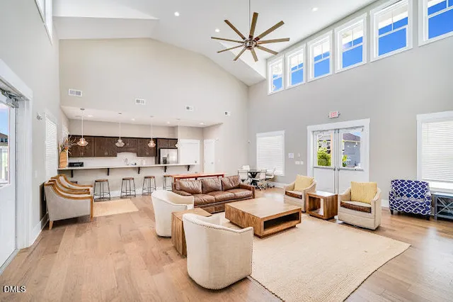 a room with gym equipment and a large window