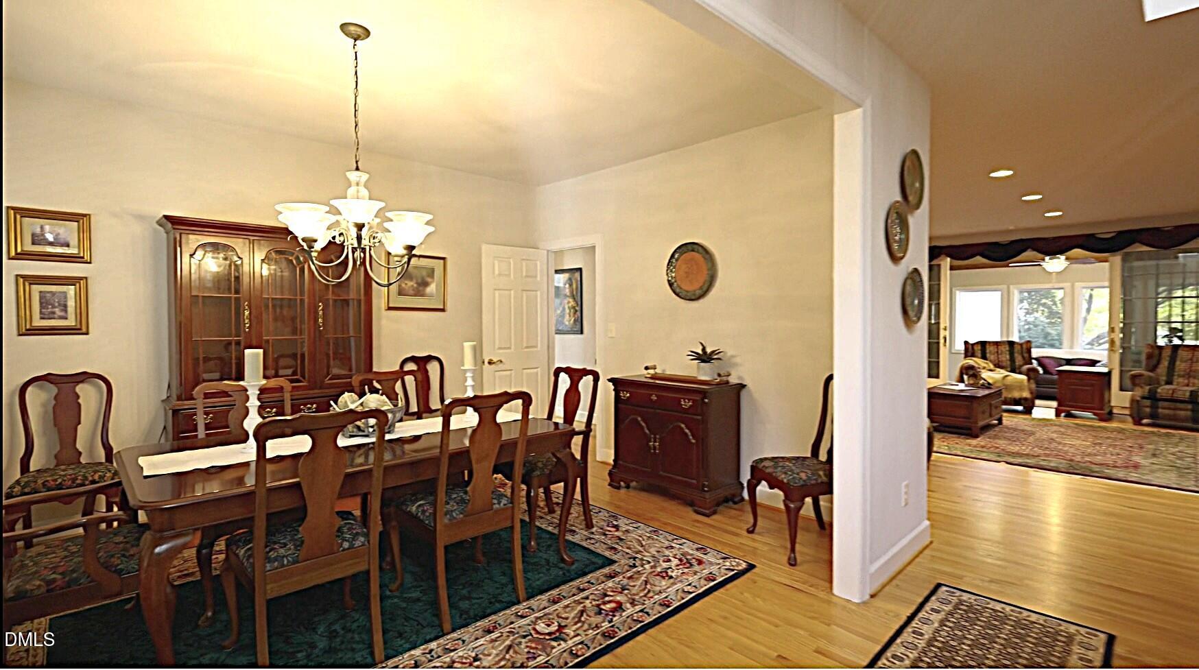 220 Jordan Narron Road Selma, NC 27576 - Photo 17 of 87 a view of a dining room with furniture and chandelier