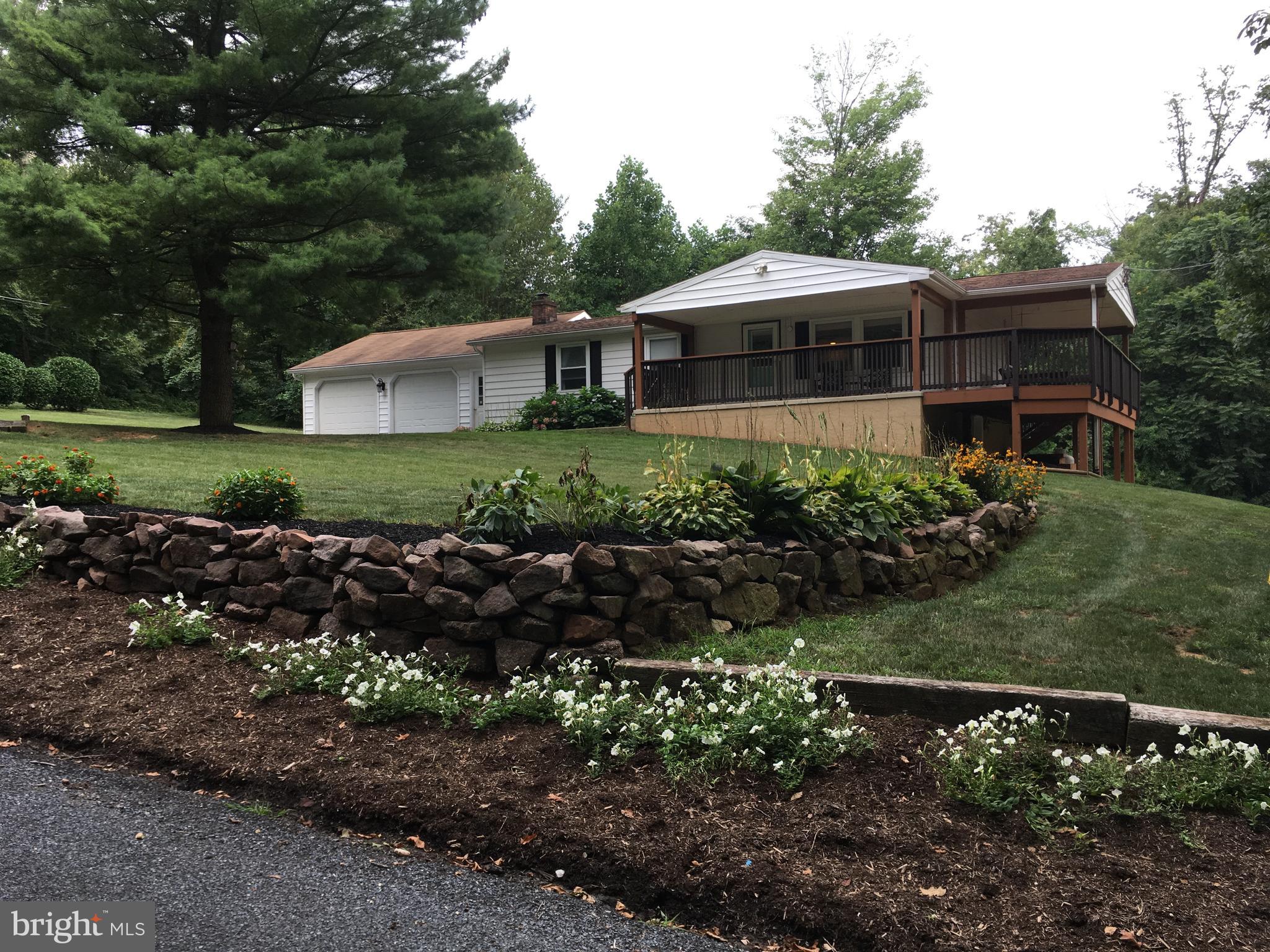 165 Mountain Road Denver, PA 17517 - Photo 2 of 37 front of home wrap around porch