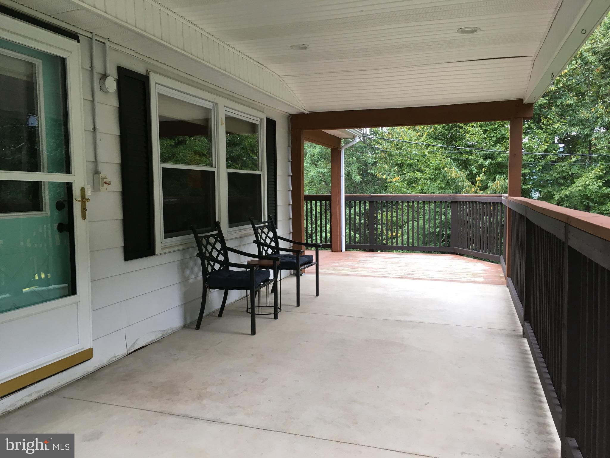 165 Mountain Road Denver, PA 17517 - Photo 3 of 37 front porch sitting area
