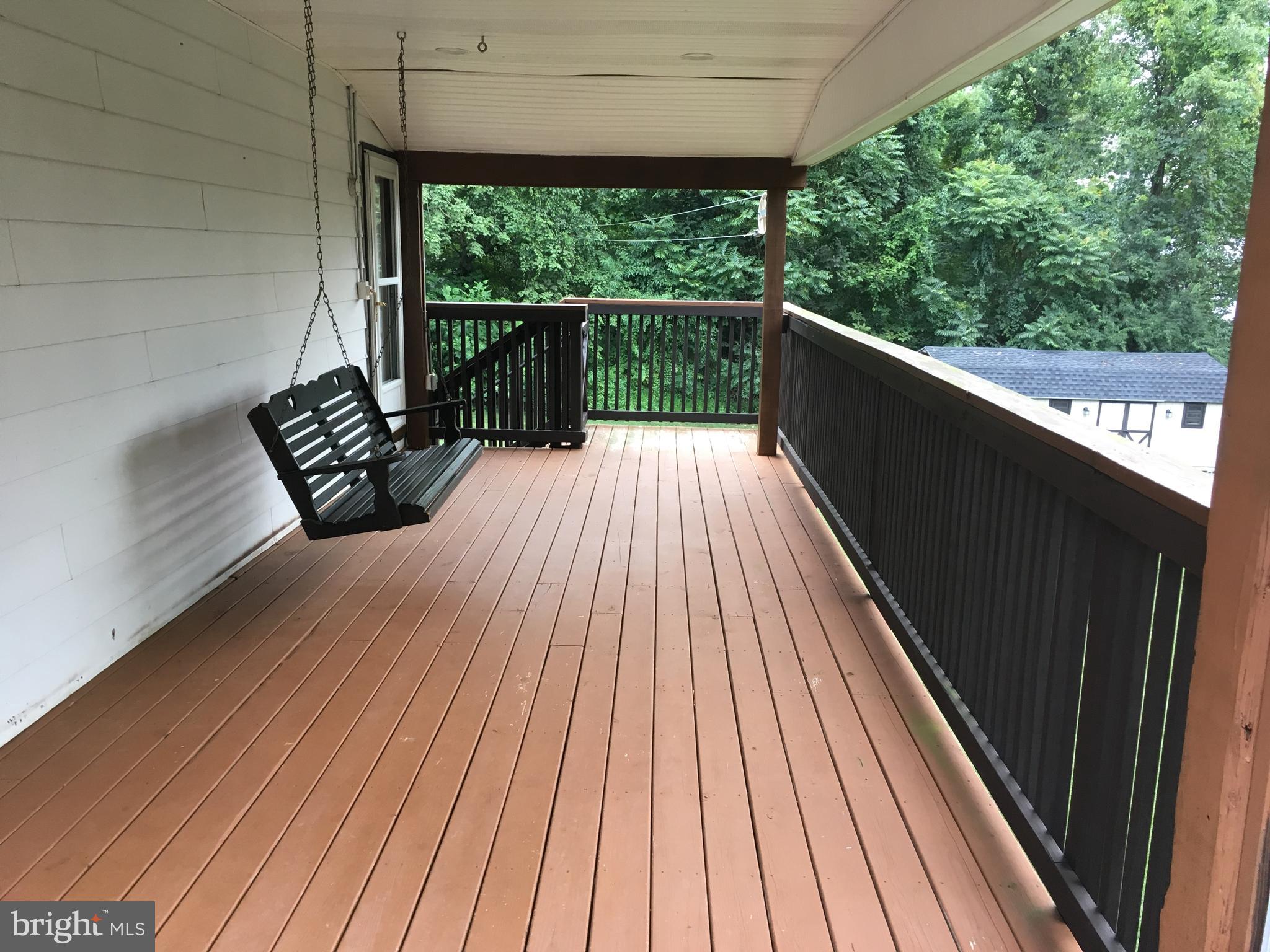 165 Mountain Road Denver, PA 17517 - Photo 4 of 37 side porch sitting area