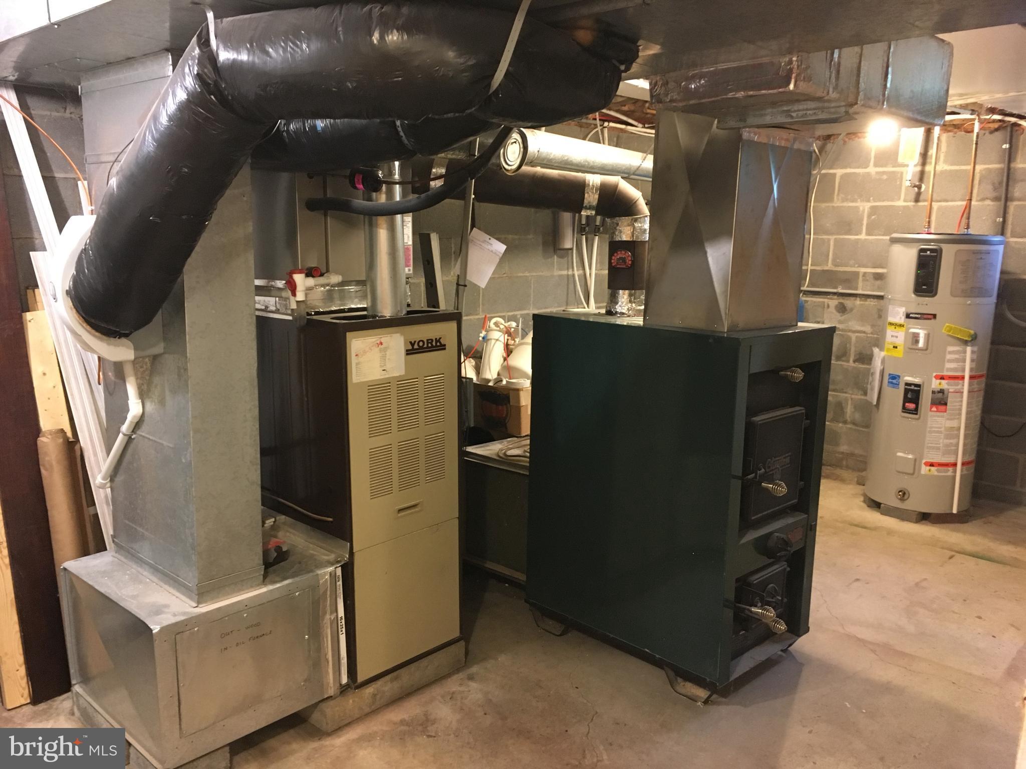 165 Mountain Road Denver, PA 17517 - Photo 35 of 37 wood/coal furnace and oil furnace tied into ducts
