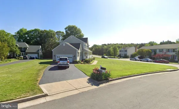 a house view with a garden space