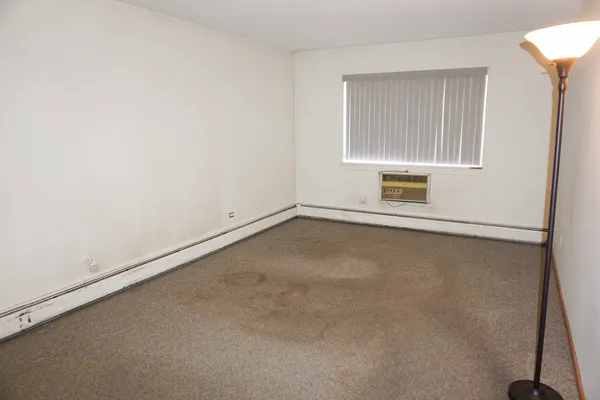 an empty room with windows