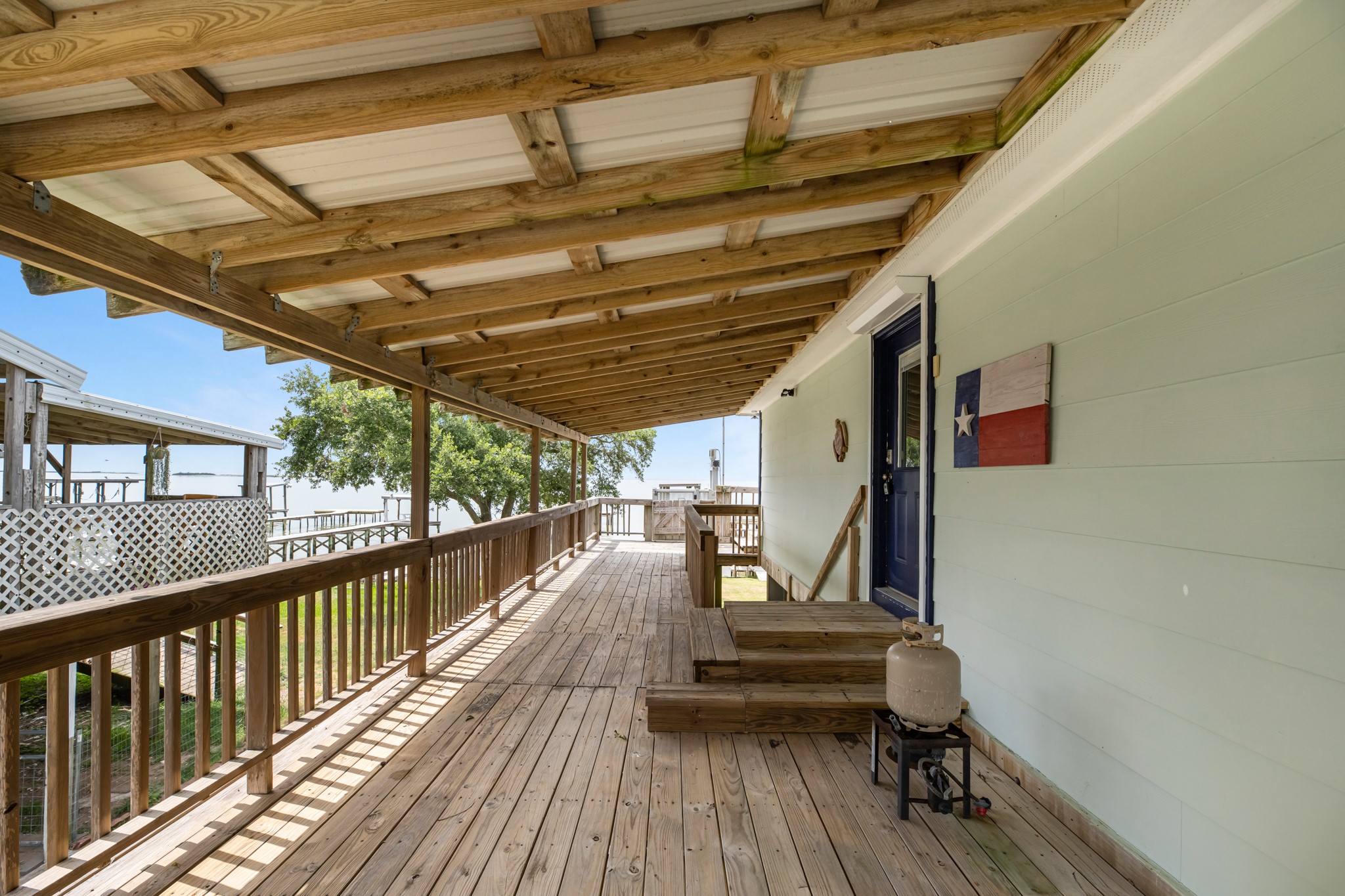 211 Captains Road Anahuac, TX 77514 - Photo 16 of 39 a view of outdoor space with seating