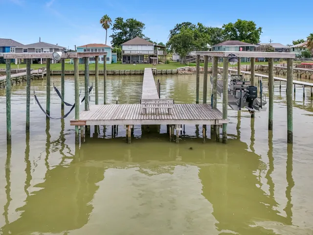a view of a lake with building in front of it