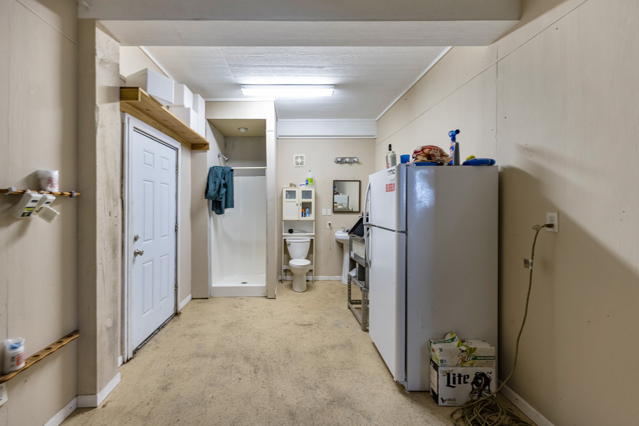 211 Captains Road Anahuac, TX 77514 - Photo 37 of 39 a view of a storage & utility room