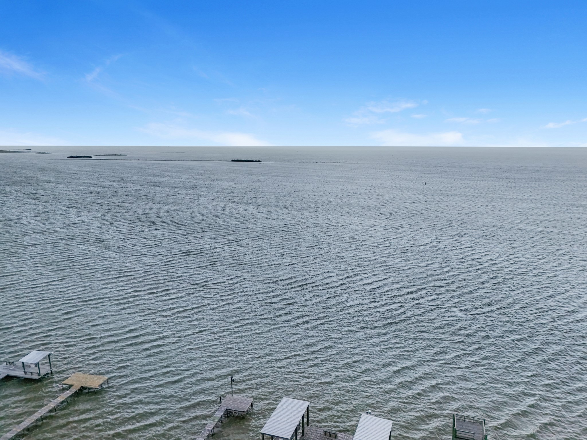 211 Captains Road Anahuac, TX 77514 - Photo 38 of 39 a view of beach and ocean