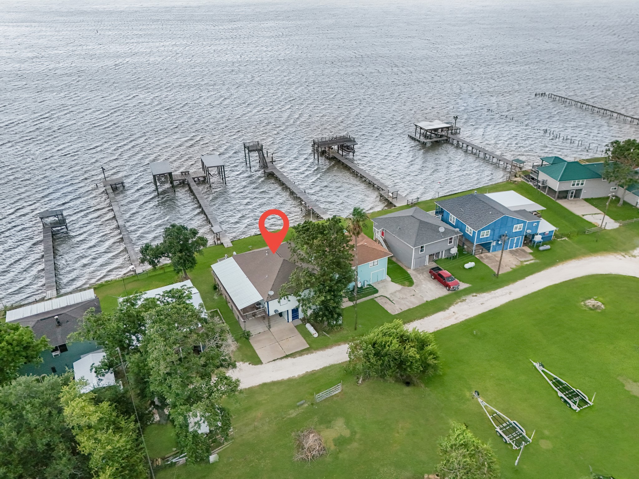 211 Captains Road Anahuac, TX 77514 - Photo 4 of 39 a view of outdoor space and yard