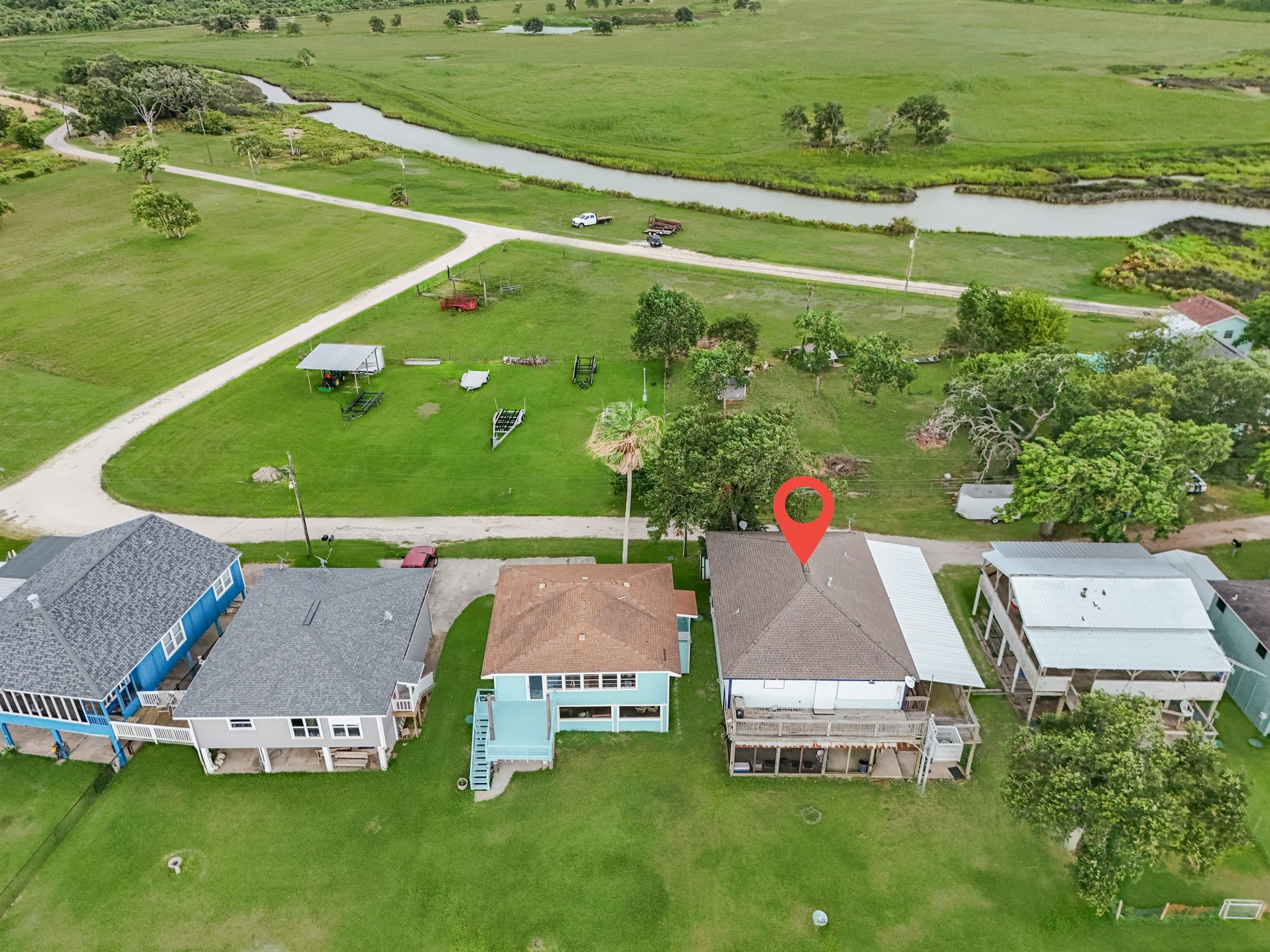 211 Captains Road Anahuac, TX 77514 - Photo 7 of 39 an aerial view of a house
