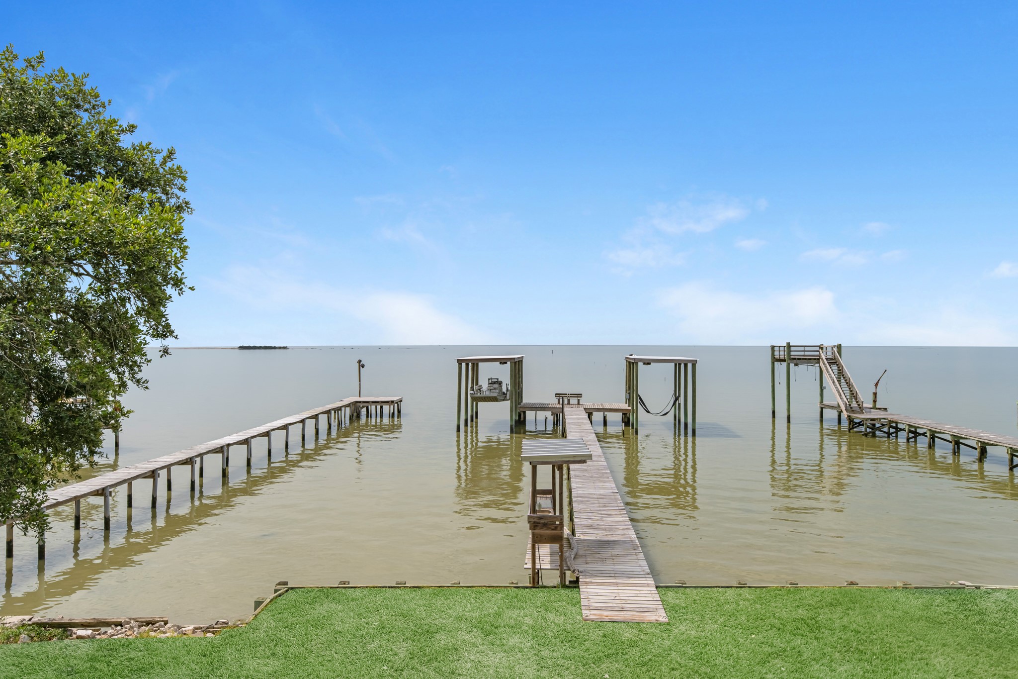 211 Captains Road Anahuac, TX 77514 - Photo 9 of 39 a view of swimming pool with seating area