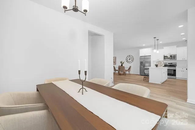 a spacious bathroom with a double vanity sink and a mirror