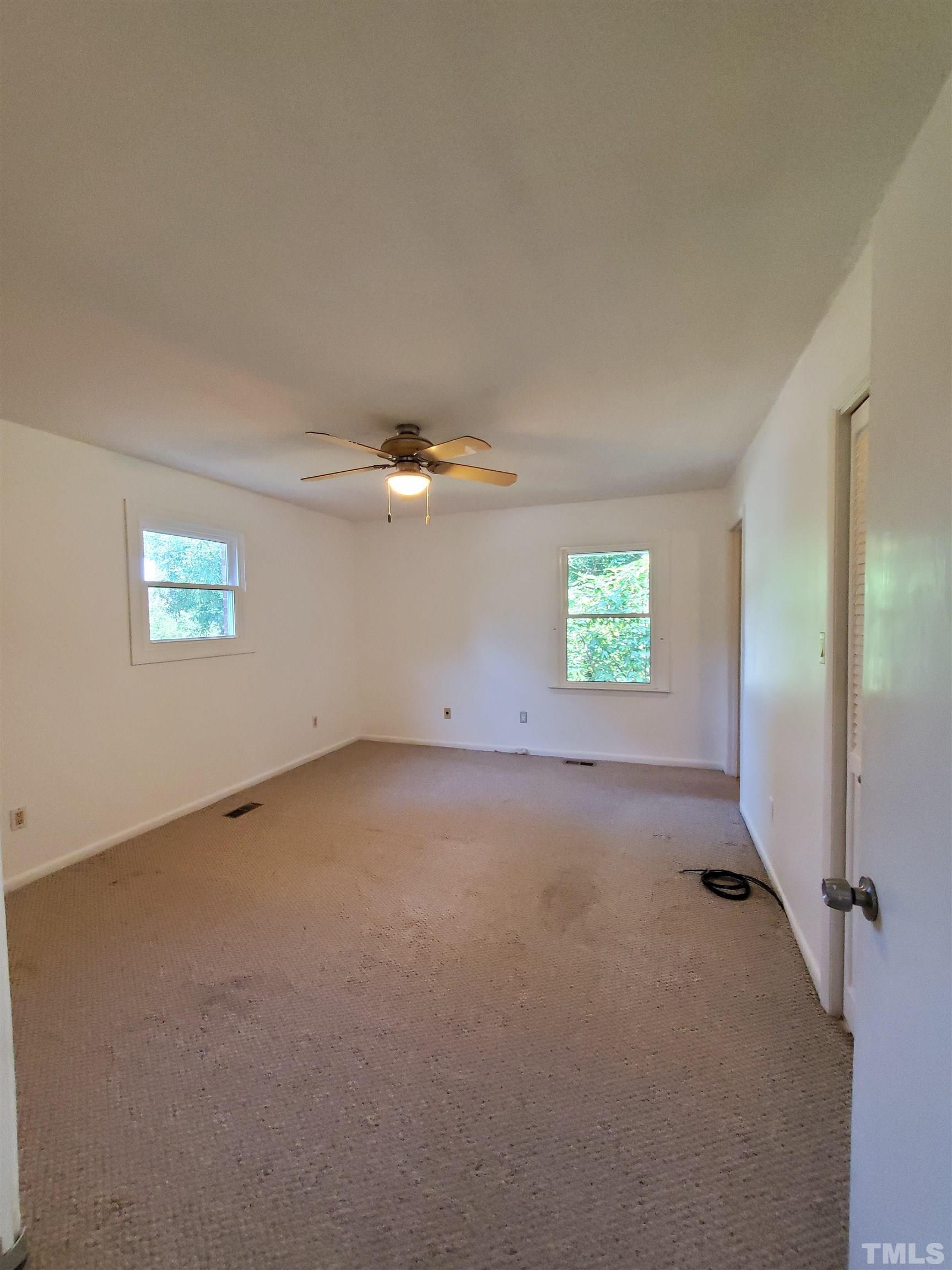3505 Neptune Drive Raleigh, NC 27604 - Photo 15 of 28 an empty room with windows