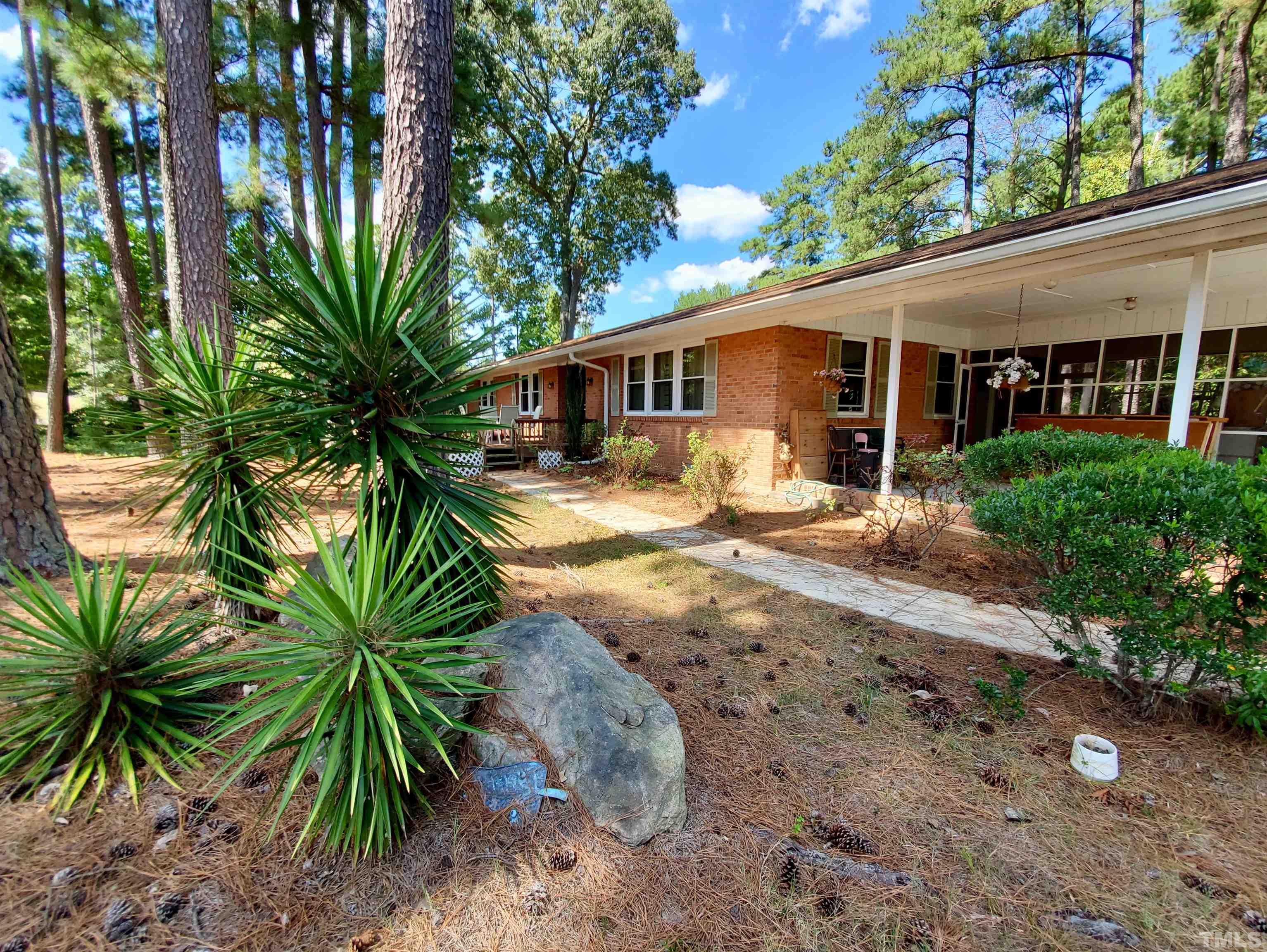 3505 Neptune Drive Raleigh, NC 27604 - Photo 24 of 28 a view of a yard in front of a house