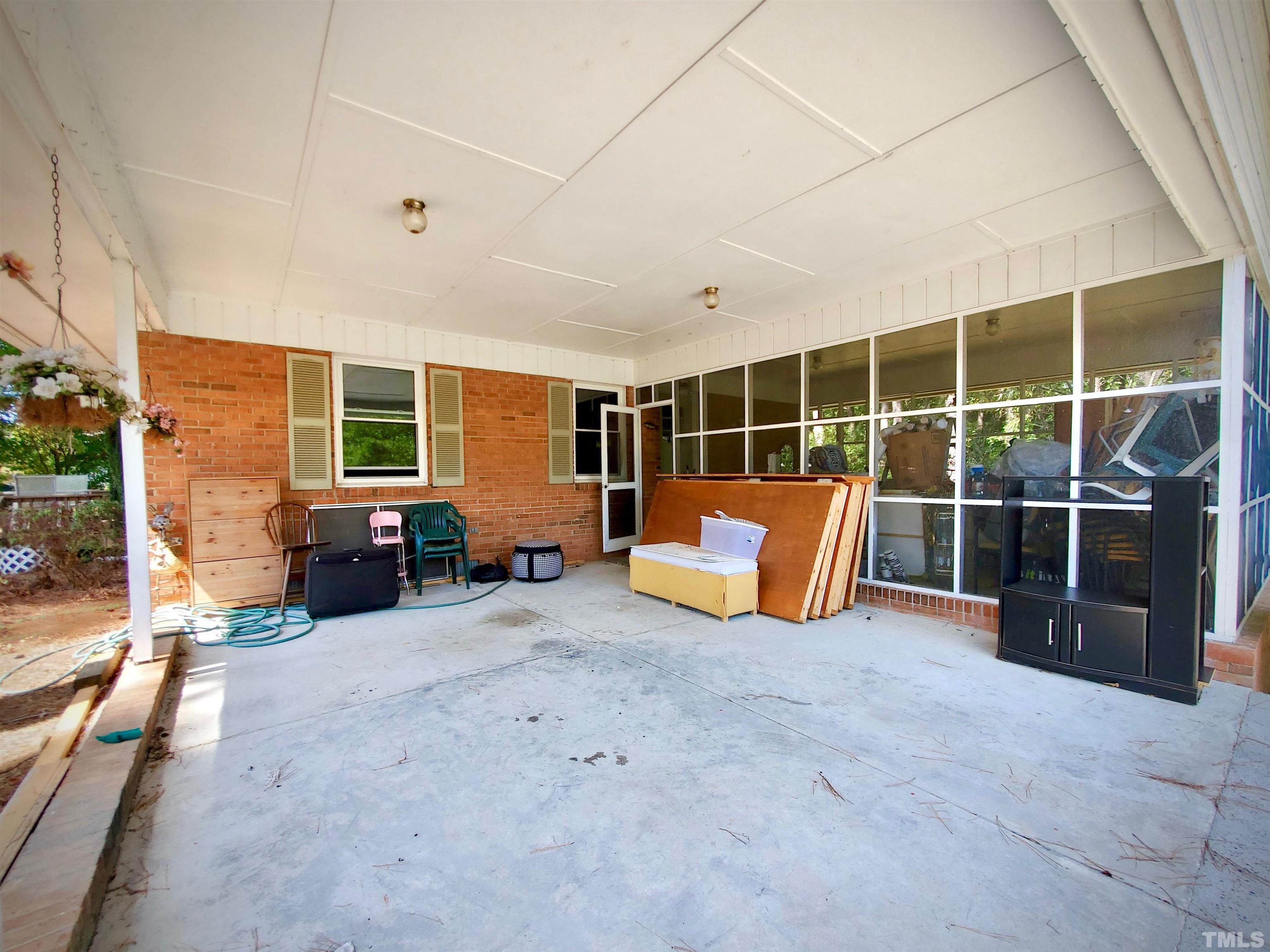 3505 Neptune Drive Raleigh, NC 27604 - Photo 26 of 28 a view of a livingroom with furniture and windows