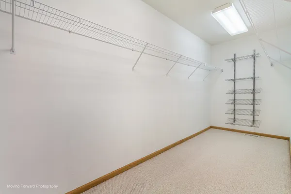 a view of a room with racks on the wall