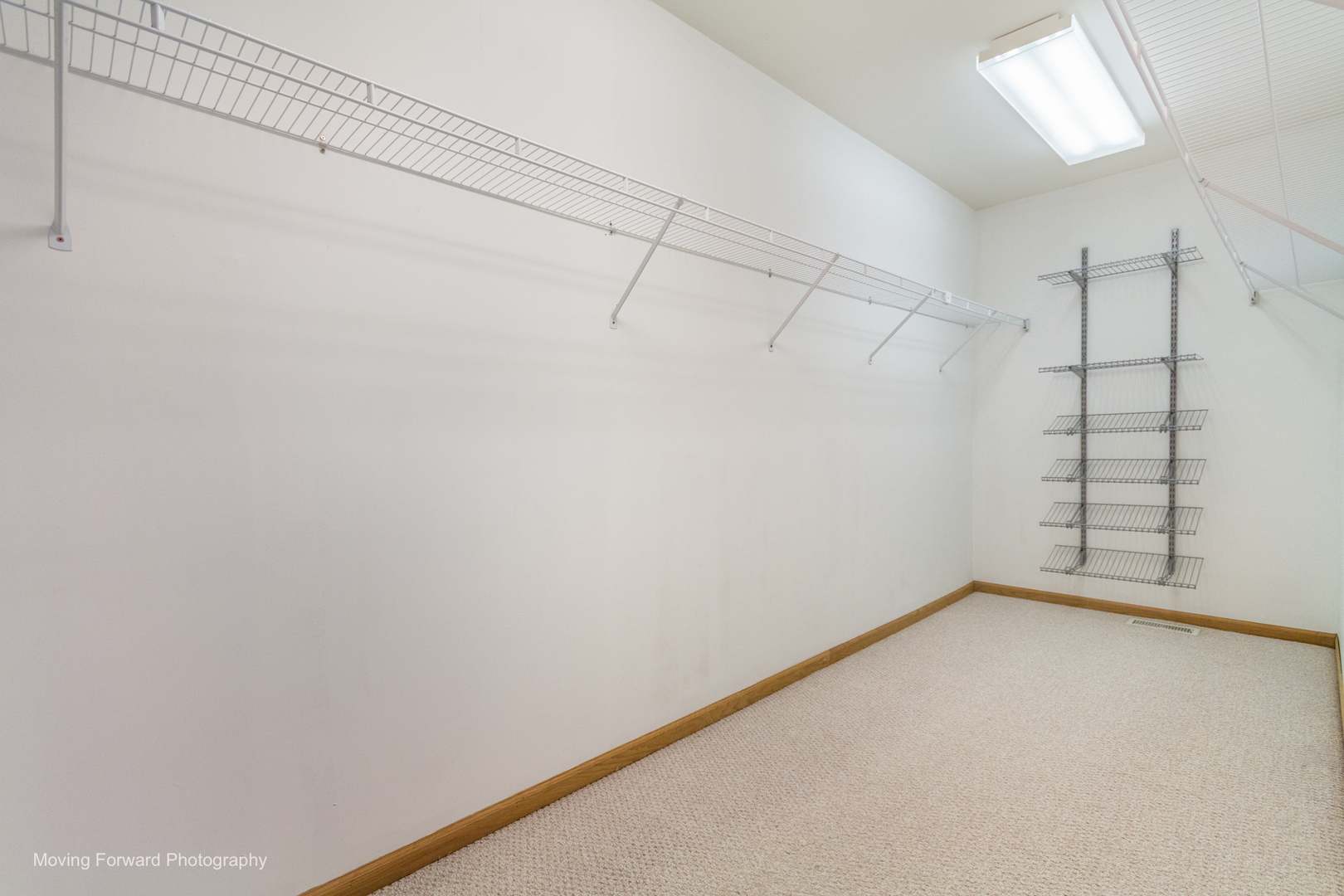 14825 Steven Court Lemont, IL 60439 - Photo 12 of 50 a view of a room with racks on the wall