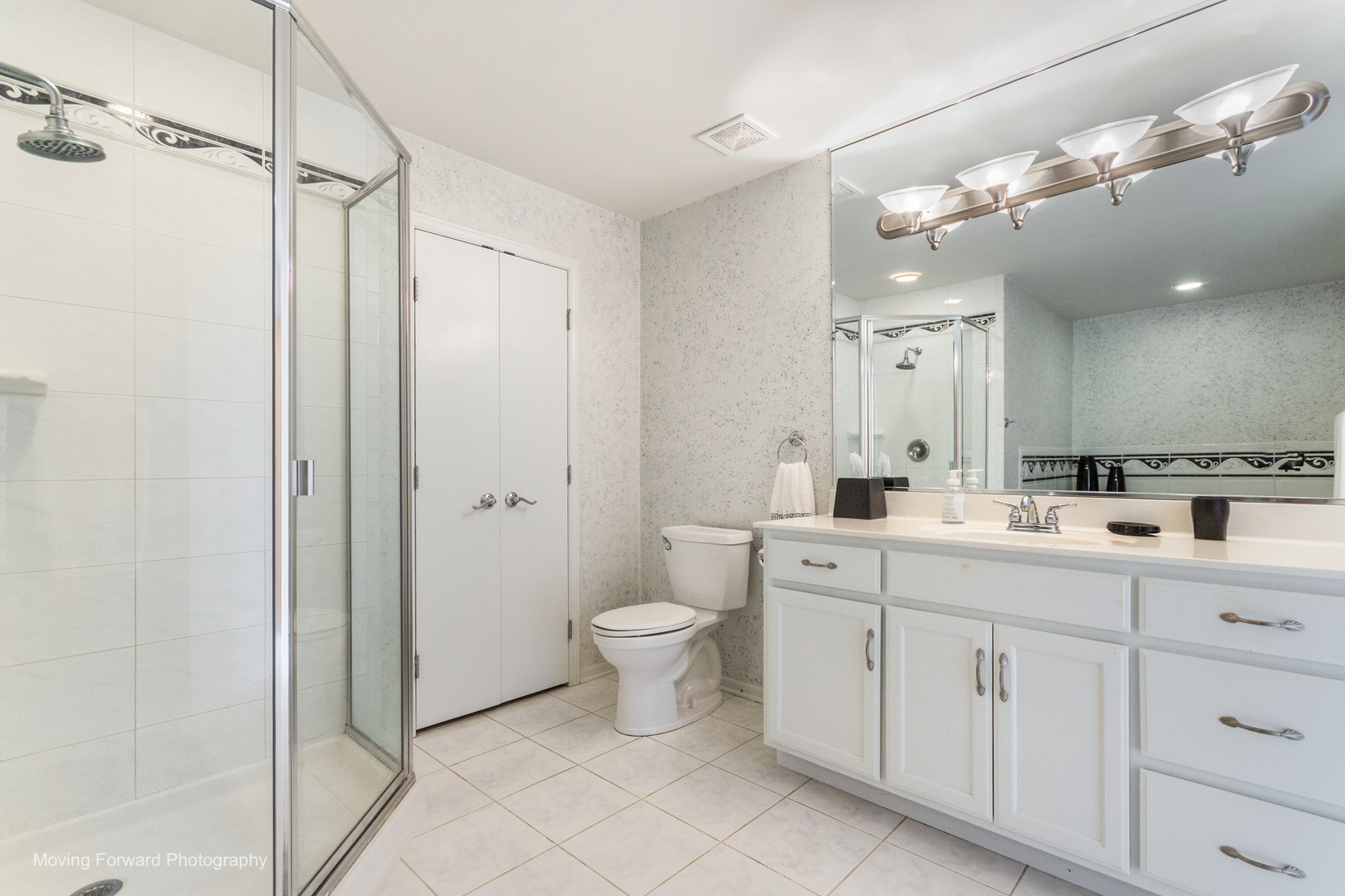 14825 Steven Court Lemont, IL 60439 - Photo 14 of 50 a bathroom with a double vanity sink mirror and toilet