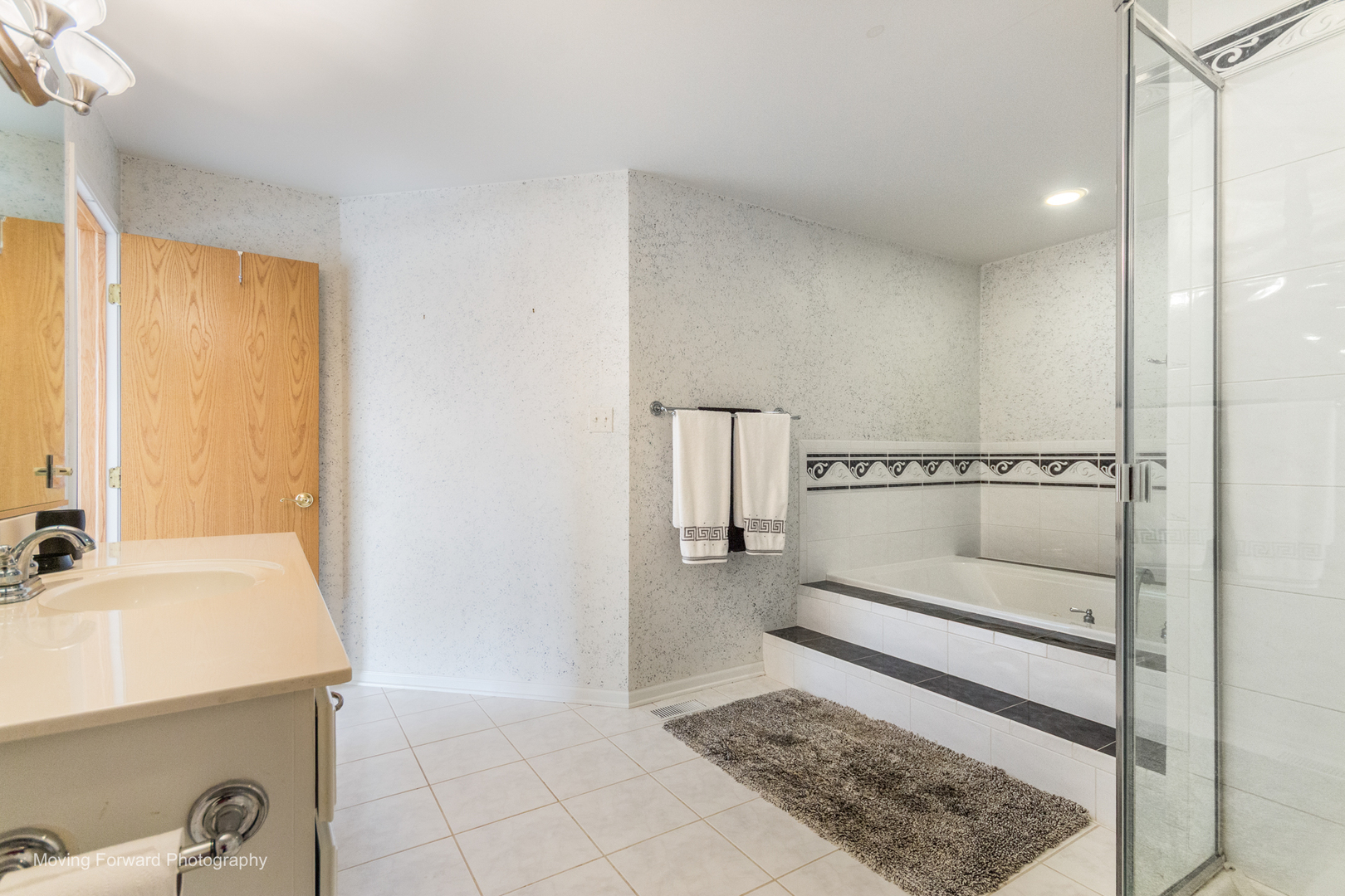 14825 Steven Court Lemont, IL 60439 - Photo 25 of 50 a bathroom with a sink and a mirror