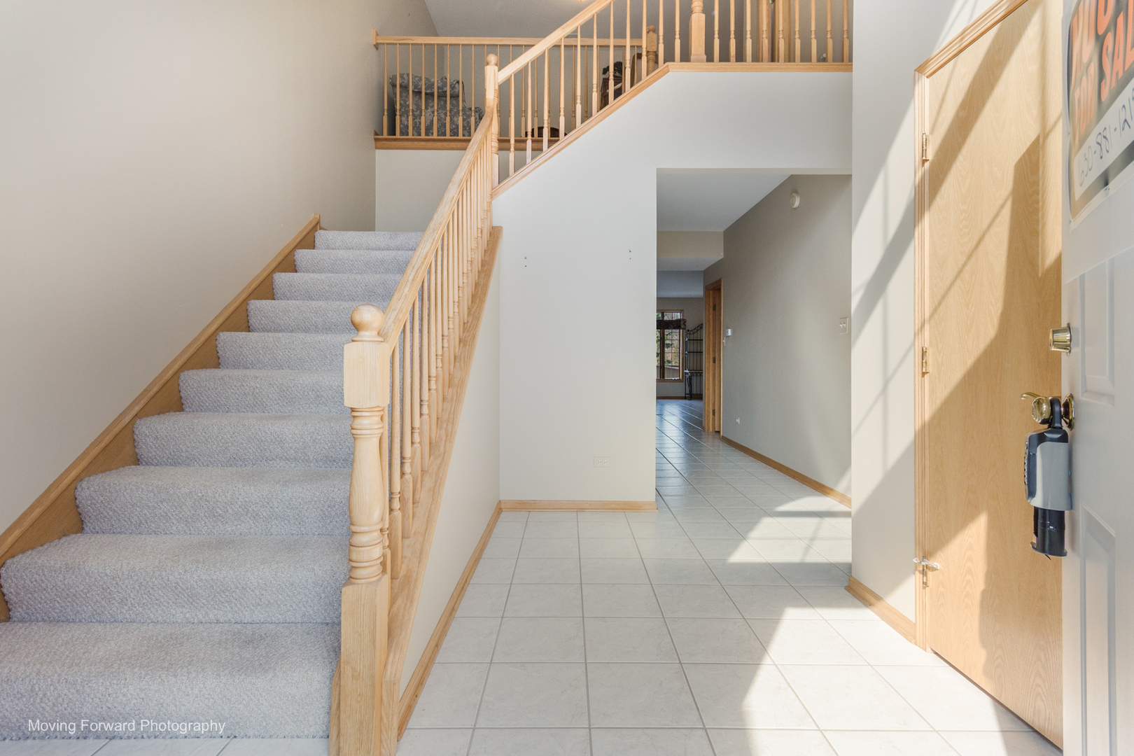 14825 Steven Court Lemont, IL 60439 - Photo 28 of 50 a view of staircase with white walls and windows
