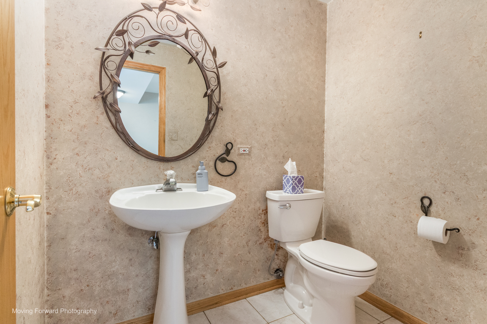 14825 Steven Court Lemont, IL 60439 - Photo 32 of 50 a bathroom with a sink a toilet and a mirror