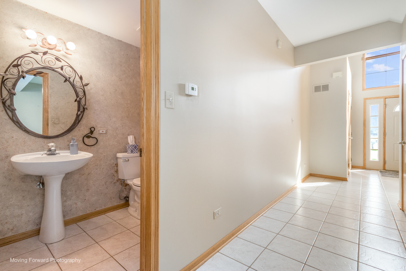 14825 Steven Court Lemont, IL 60439 - Photo 33 of 50 a view of a bathroom with sink and mirror