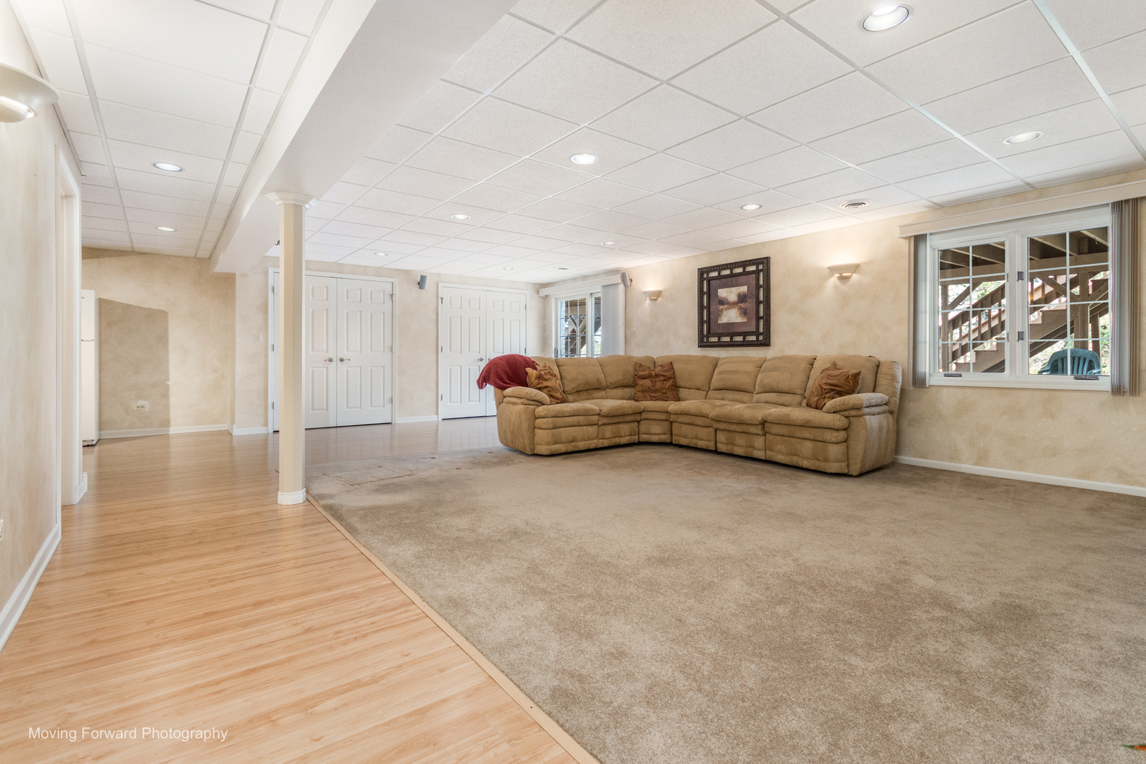 14825 Steven Court Lemont, IL 60439 - Photo 49 of 50 a living room with furniture and a flat screen tv