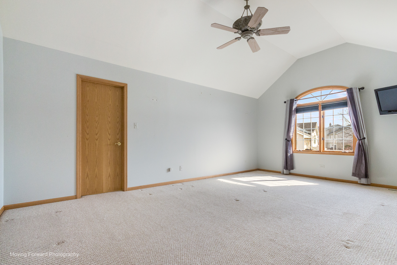 14825 Steven Court Lemont, IL 60439 - Photo 10 of 50 a view of a livingroom with a ceiling fan and window