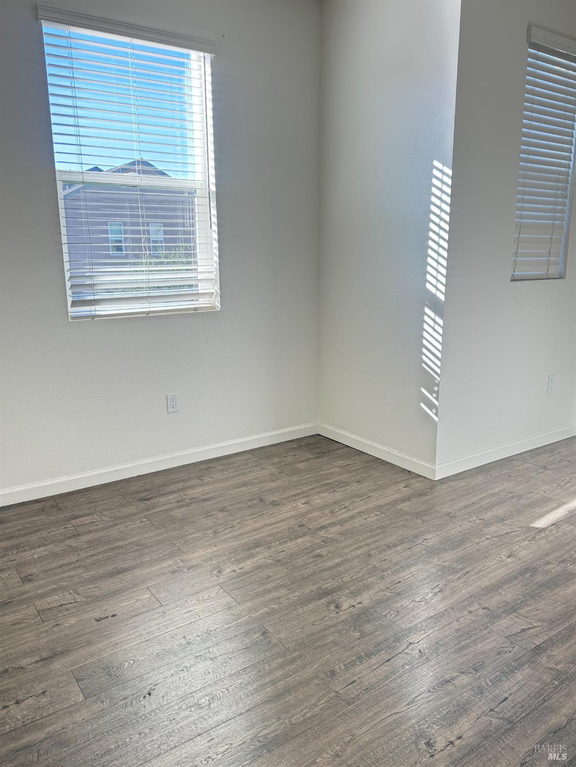 524 Blythewood Place Santa Rosa, CA 95407 - Photo 11 of 21 wooden floor in an empty room with a window