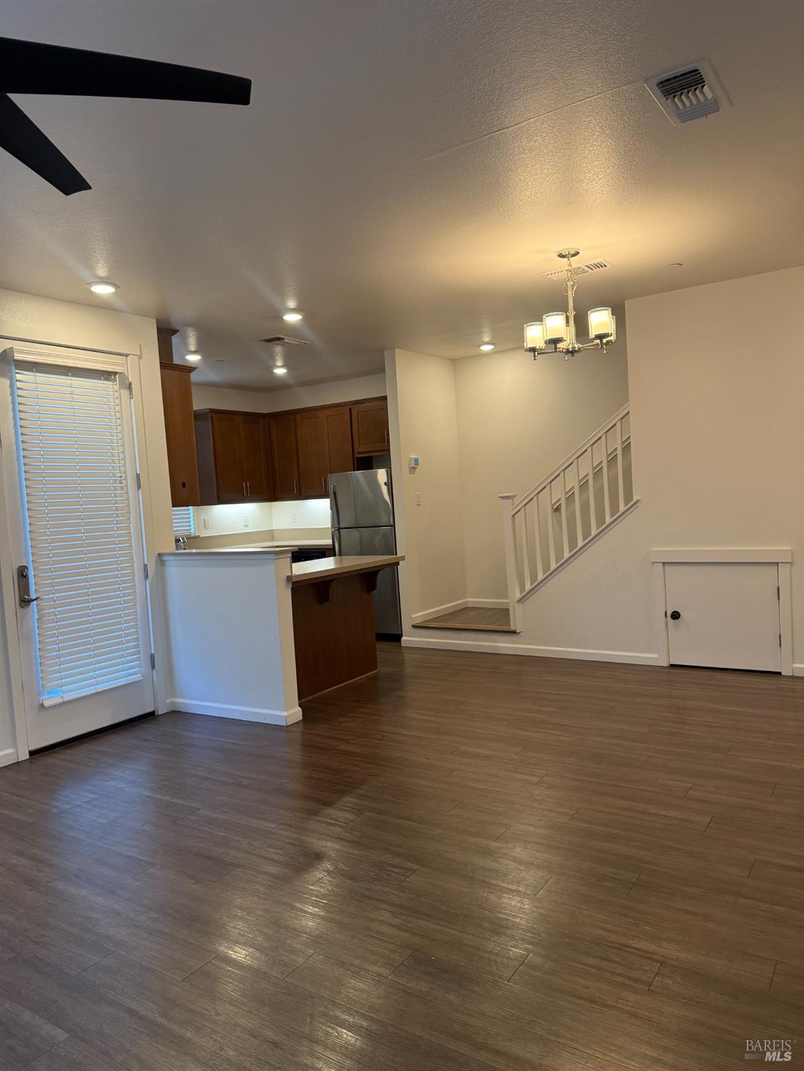 524 Blythewood Place Santa Rosa, CA 95407 - Photo 4 of 21 a view of a room with wooden floor and white walls
