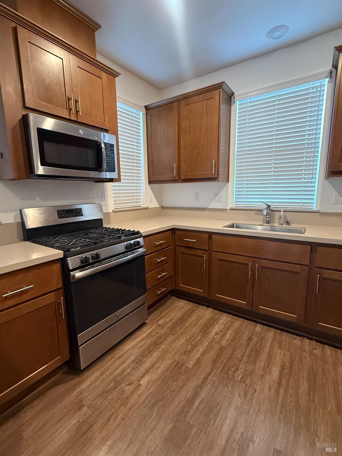 524 Blythewood Place Santa Rosa, CA 95407 - Photo 5 of 21 a kitchen with stainless steel appliances a stove sink and microwave