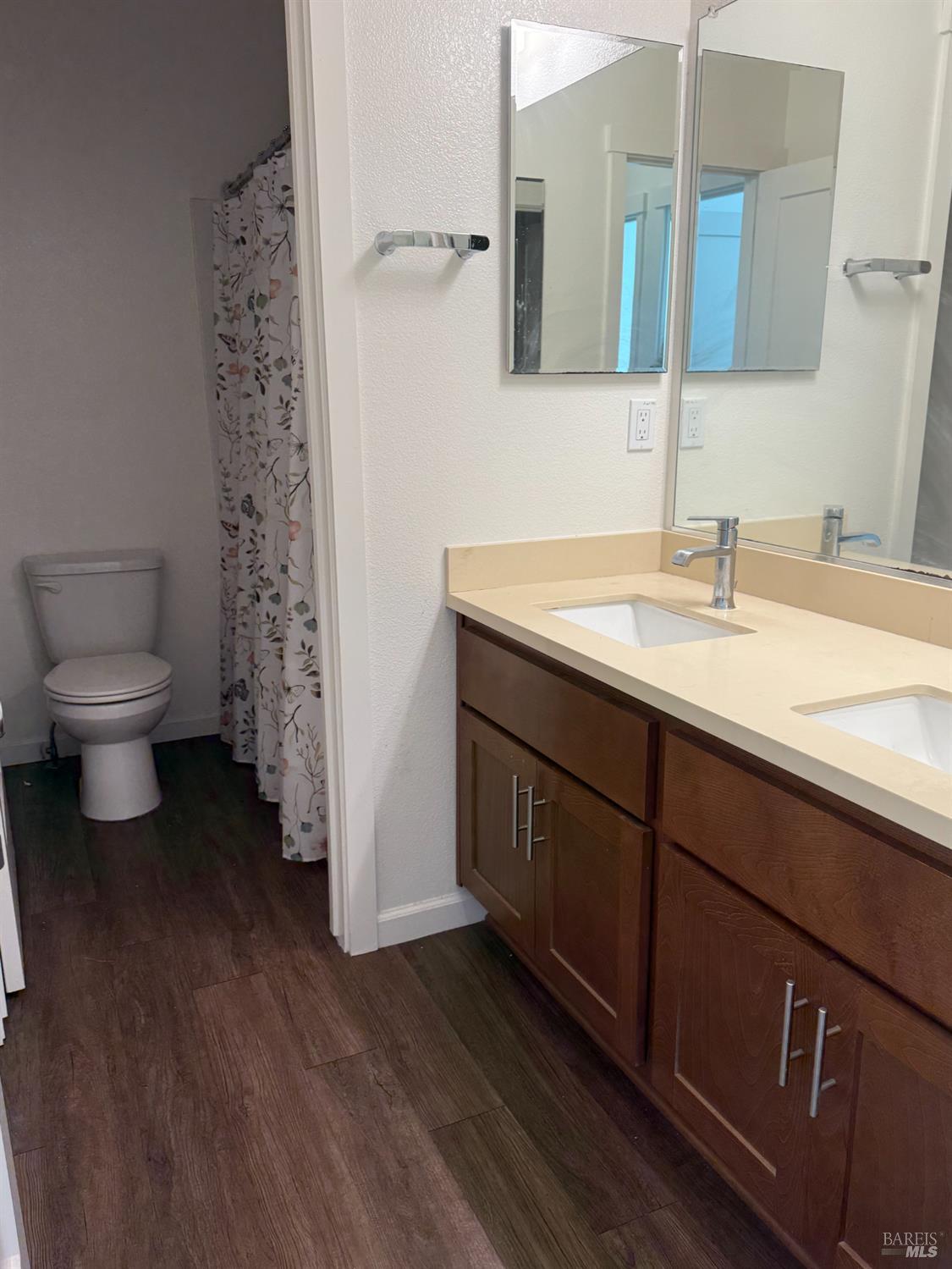 524 Blythewood Place Santa Rosa, CA 95407 - Photo 10 of 21 a bathroom with a sink a toilet and a mirror
