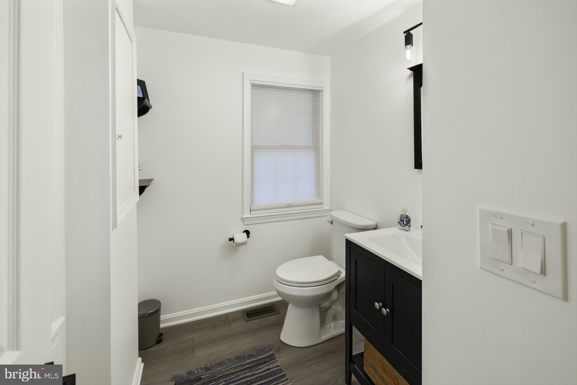 229 Boy Scout Road New Oxford, PA 17350 - Photo 12 of 73 a bathroom with a sink toilet and vanity