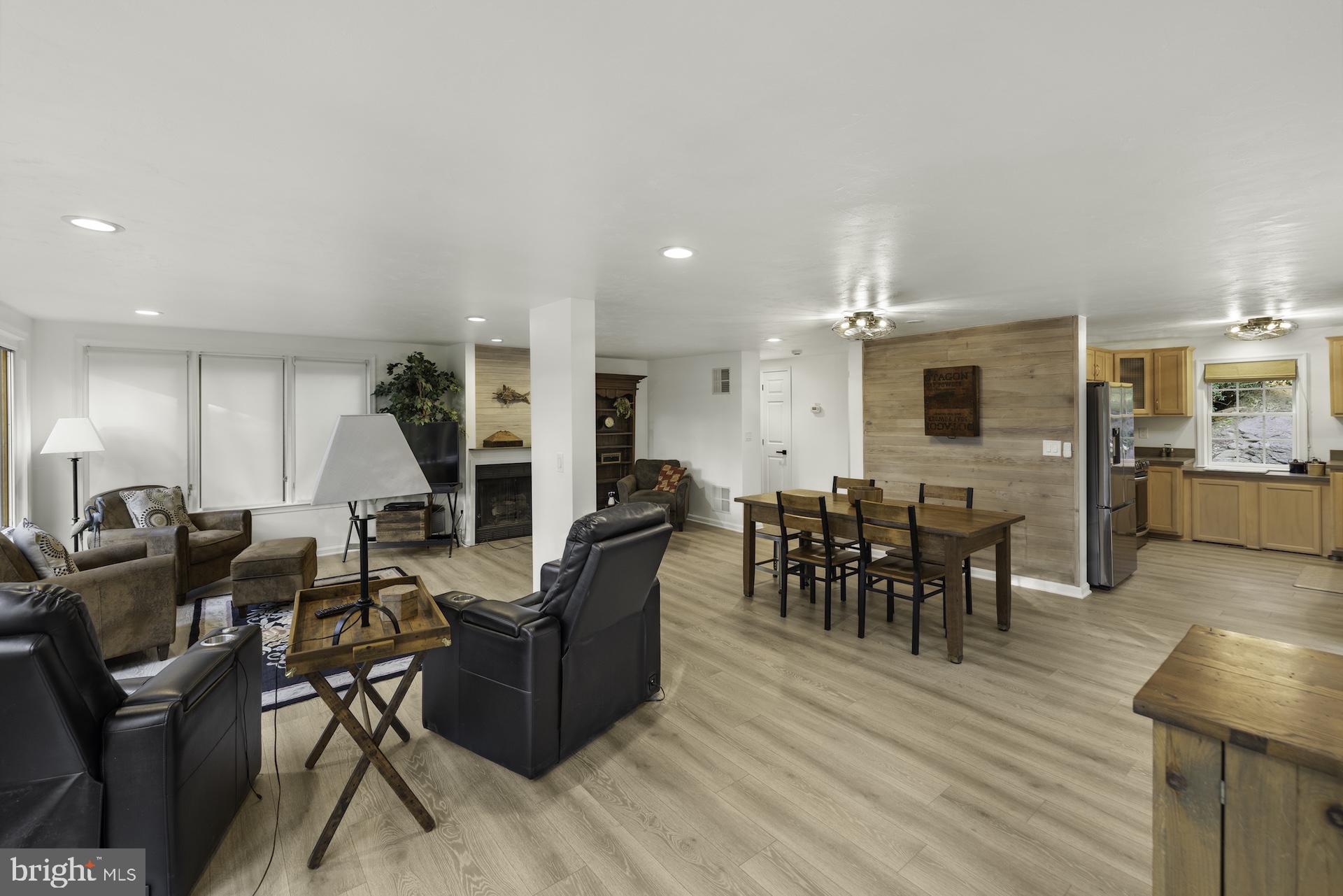 229 Boy Scout Road New Oxford, PA 17350 - Photo 13 of 73 a view of a dining room with furniture window and wooden floor