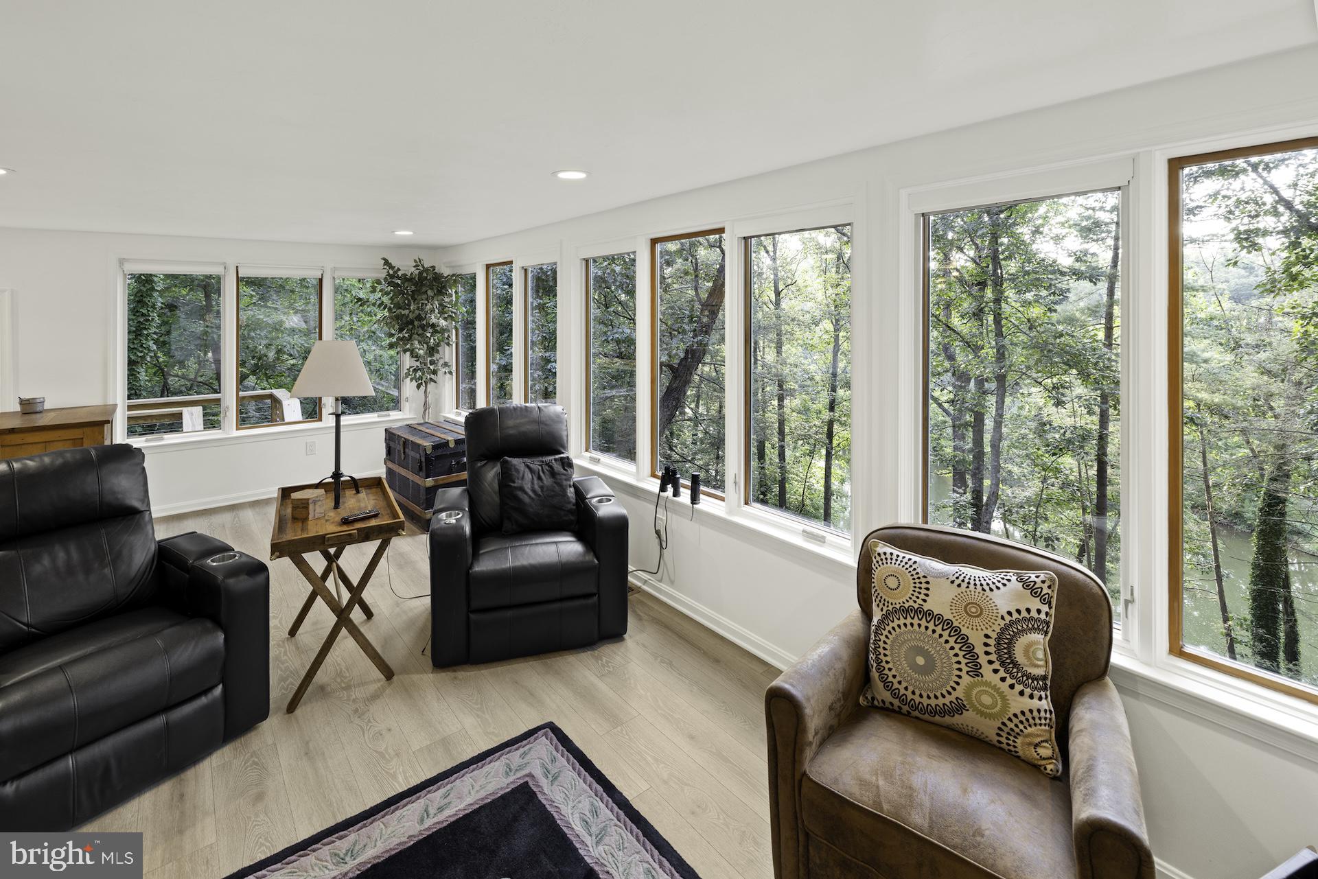 229 Boy Scout Road New Oxford, PA 17350 - Photo 14 of 73 a living room with furniture and a large window